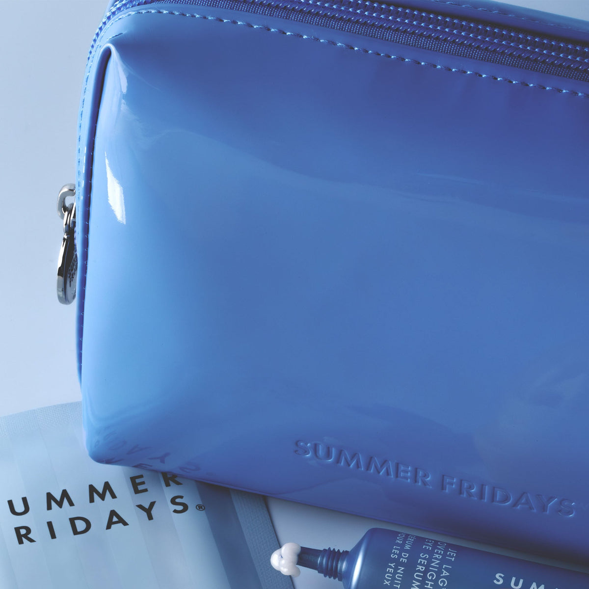 glossy-pouch-in-jet-lag-blue-e3 Glossy-Pouch-Jet-Lag.jpg